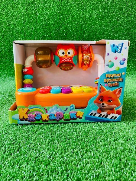 Музичний центр "Казкарики" 83339 WToys підсвічування, пісні, казки, віршики, ноти, брязкальця, кільця, каруселі, перемикач режимів 178797 фото