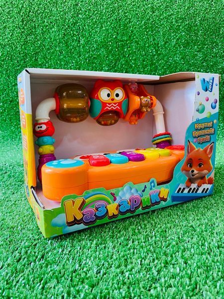 Музичний центр "Казкарики" 83339 WToys підсвічування, пісні, казки, віршики, ноти, брязкальця, кільця, каруселі, перемикач режимів 178797 фото